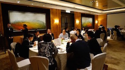 Attendees seized the time to interact with others during dinner time.