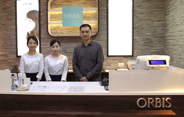 Photo of IT supervisor of the administration department and ORBIS store staff